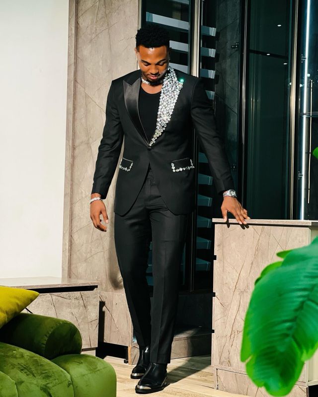 black tux with silver bowtie