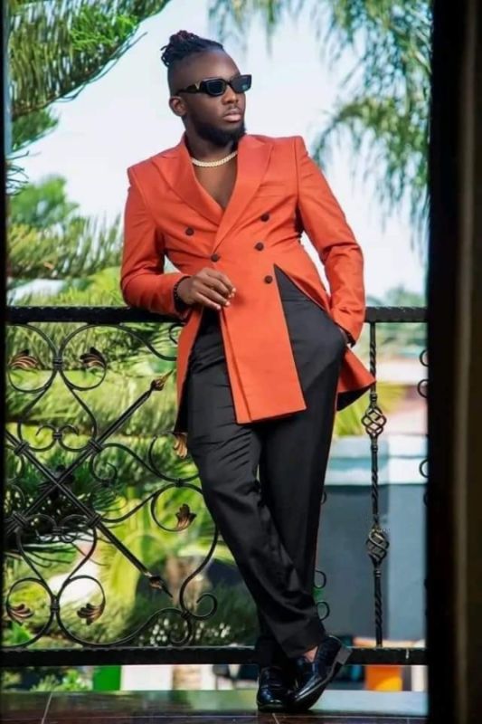 Channing Stylish Orange Peaked Lapel Double Breasted Prom Suits With Front Vents